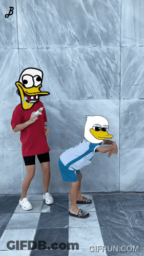 Girl In Red Shirt Standing Next To Boy With Duck Head GIF