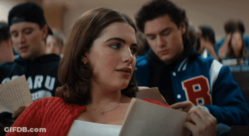 Girl In Red Sweater Reading Book GIF