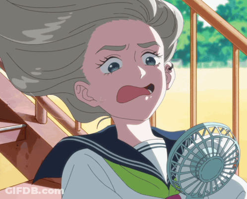 Girl In Sailor Suit Holding Small Fan GIF