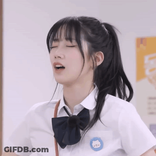 Girl In School Uniform Blue Badge A GIF
