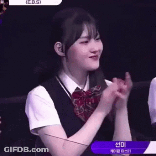Girl In School Uniform Clapping On Stage GIF