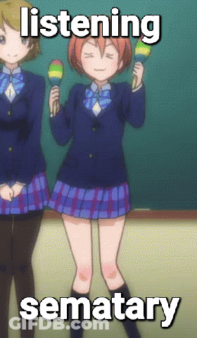 Girl In School Uniform Holding Maracas Saying Listening Sematary GIF