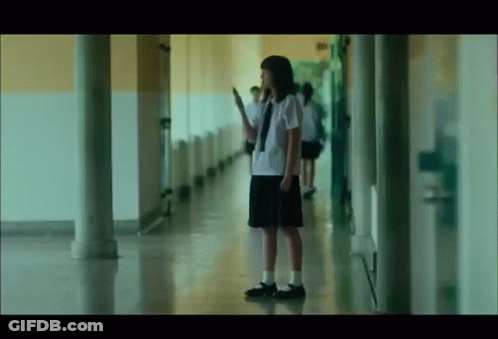 Girl In School Uniform Holding Sword GIF