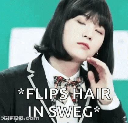 Girl In School Uniform Making Funny Face Holding Hand To Face GIF