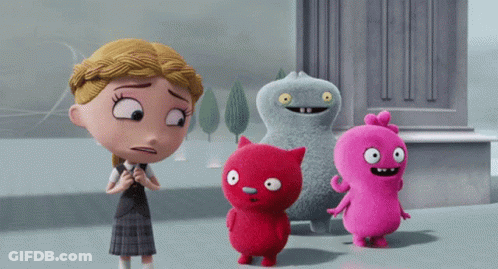 Girl In School Uniform Next To Stuffed Animals GIF