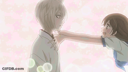 Girl In School Uniform Reaching To Touch Man's Neck GIF