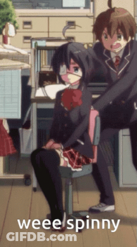 Girl In School Uniform Sitting By Boy In Suit Saying Wee Spinny GIF