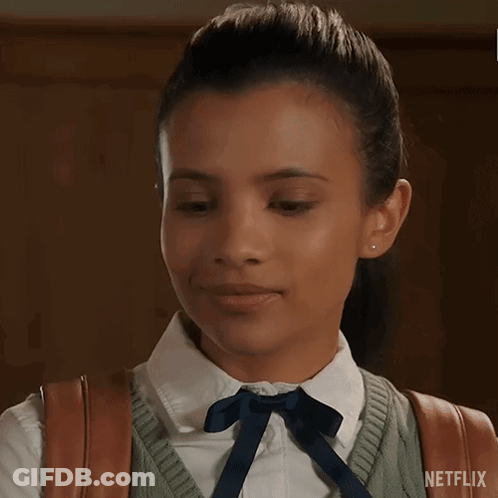 Girl In School Uniform Smiling With Eyes Closed GIF