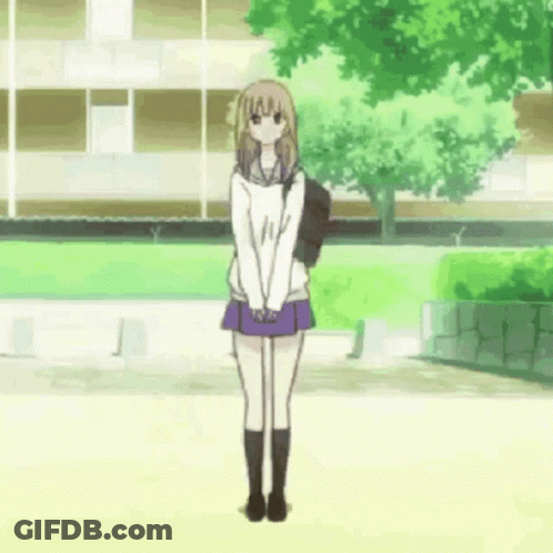 Girl In School Uniform Standing In Front Of Building GIF