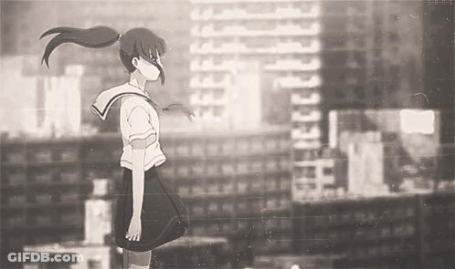 Girl In School Uniform Standing In Front Of Building GIF