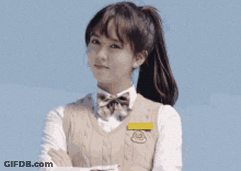 Girl In School Uniform With Arms Crossed GIF