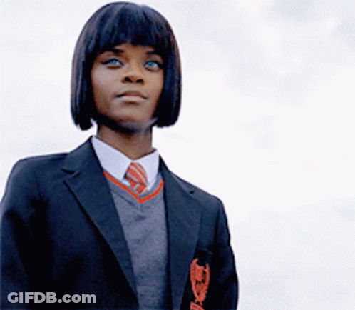 Girl In School Uniform With Badge Saying A GIF