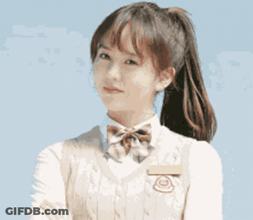 Girl In School Uniform With Ponytail And Bow Tie GIF