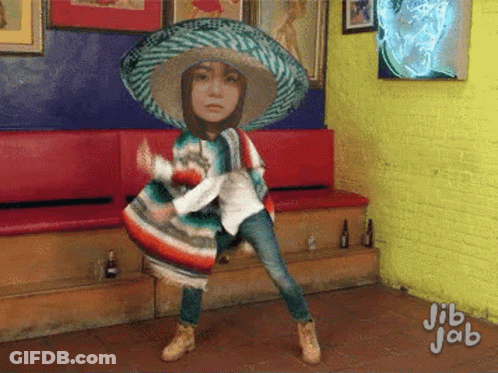 Girl In Sombrero And Poncho Dancing GIF