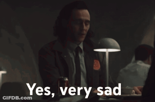 Girl In Suit Peeking Out Door Saying So Anyway GIF