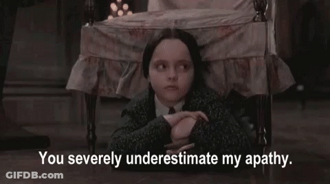 Girl In Suit Sitting With You Severely Underestimate My Apathy Text GIF