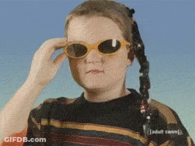 Girl In Sunglasses And Adult Swim Sweater GIF