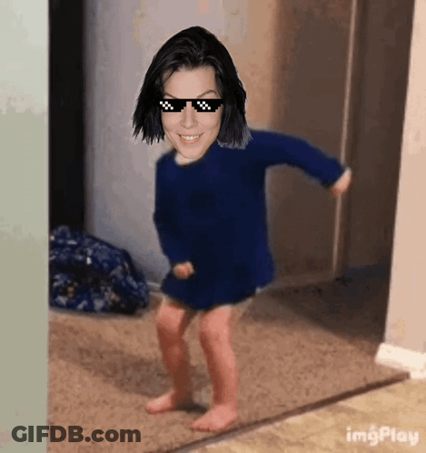 Girl In Sunglasses And Blue Sweater Dancing GIF