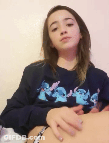Girl In Sweatshirt With Stitches GIF