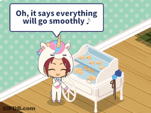 Girl In Unicorn Costume Beside Cookie Cart GIF