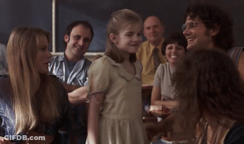 Girl In White Dress And Man With Glasses GIF