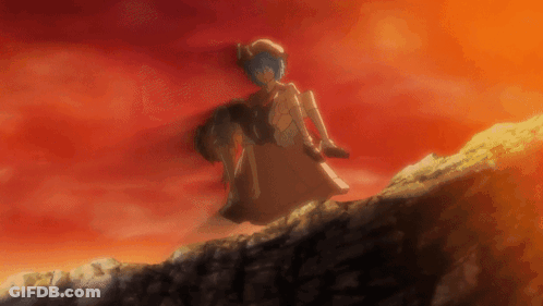 Girl In White Dress Standing On Rock GIF