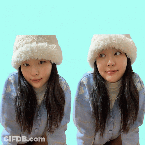 Girl In White Hat And Blue Sweater GIF
