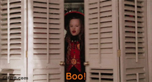 Girl In Witch Costume Peeking From Closet Saying Boo GIF