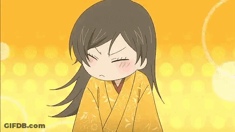 Girl In Yellow Kimono Making Funny Face GIF