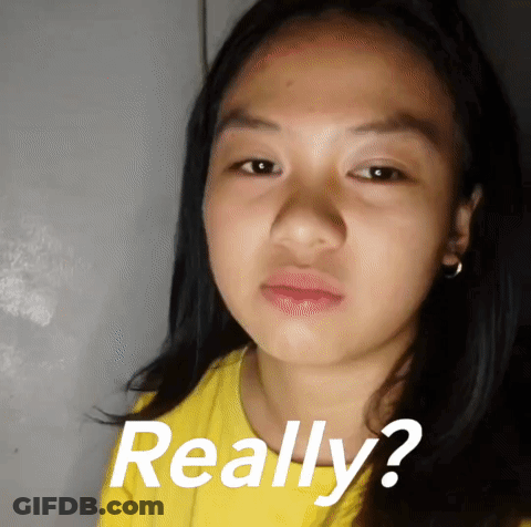 Girl In Yellow Shirt Making Funny Face Really GIF