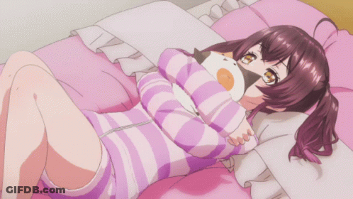 Girl Laying Down With Cat Pillow GIF
