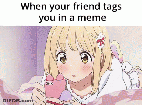 Girl Laying On Bed Looking At Phone When Your Friend Tags You In A Meme GIF
