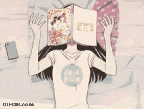 Girl Laying On Bed With Book Covering Face GIF