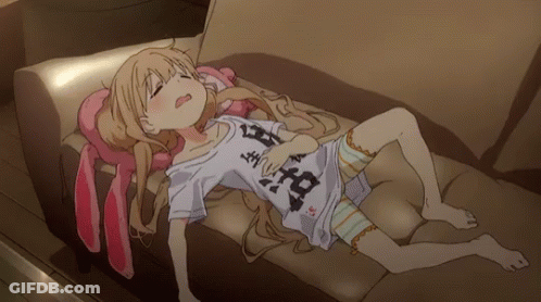 Girl Laying On Couch In Aoi Shirt GIF