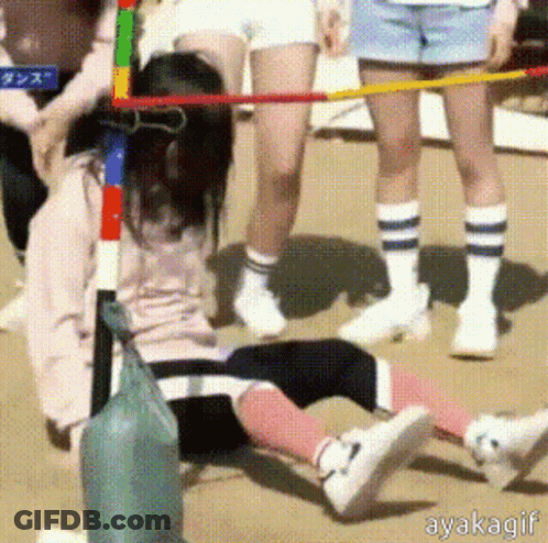 Girl Laying On Ground In Front Of Hula Hoop Ayakagif GIF