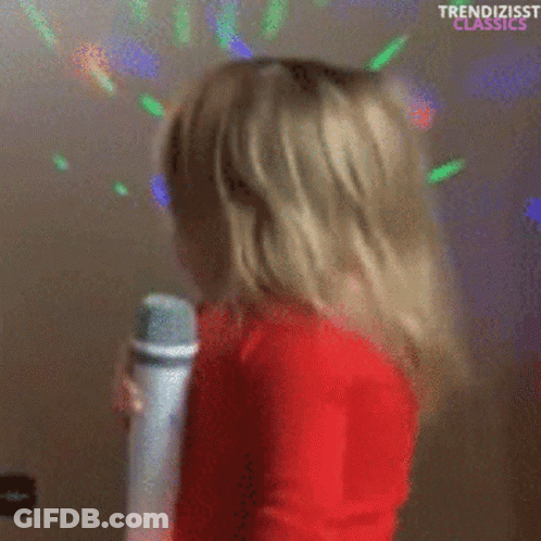 Girl Lying On Bed Next To Water Bottle GIF