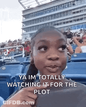 Girl Making Funny Face At Stadium GIF