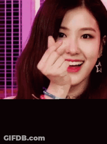 Girl Making Heart Shape GIF