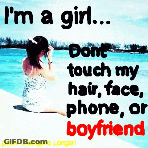 Girl On Beach Talking On Cell Phone Saying I'm A Girl GIF