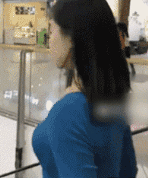 Girl On Fire Escalator Trick GIF