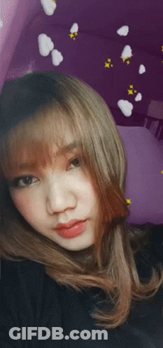 Girl On Purple Background With White Clouds GIF