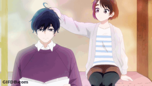 Girl Petting Boy's Head While He Reads GIF