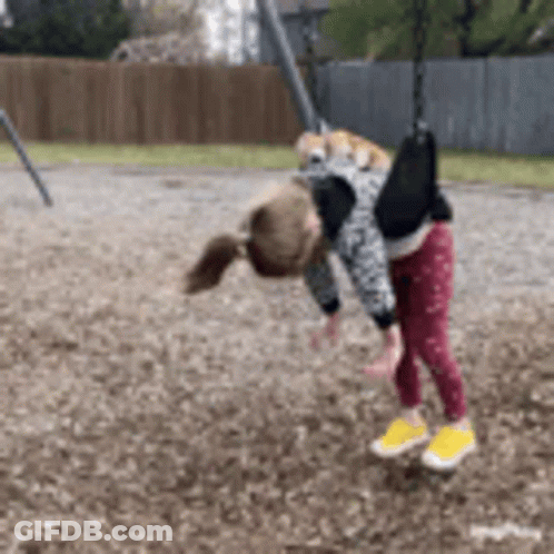 Girl Playing On Swing GIF