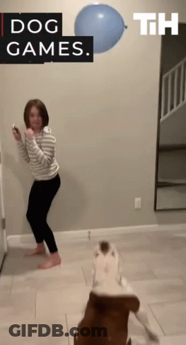 Girl Playing Video Game With Dog Saying Dog Games GIF