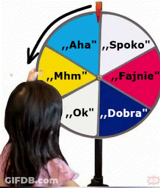 Girl Pointing At Colorful Spinning Wheel With Foreign Words GIF
