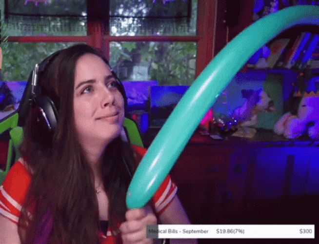 Girl Pops Balloons GIF