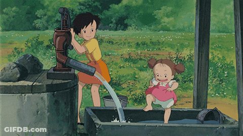 Girl Pumping Water From Well With Girl In Bucket GIF
