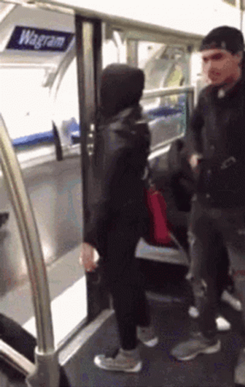 Girl Pushed Out Of Train GIF