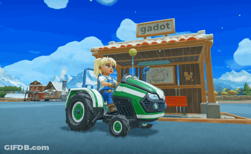 Girl Riding Green Tractor In Front Of Gadot Sign GIF