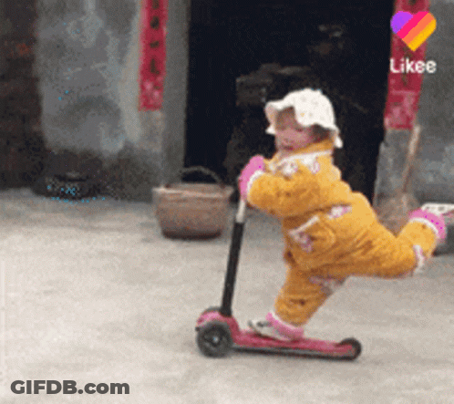Girl Riding Scooter With Like Icon GIF